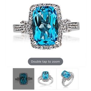 BLUE TOPAZ AND CREATED WHITE SAPPHIRE RING